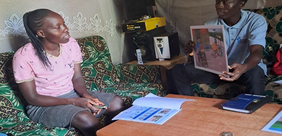 Getray Vugutsa and her ECD promoter John Osome during one of the regular home visits
