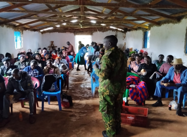 The GSU commander Western region, Mr. Thoma Kipkolei, addressed the community during the community Barasa on Women and Girls' rights protections on 9th March 2026 at Maranatha church, Chepyuk.