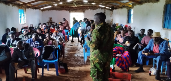 The GSU commander Western region, Mr. Thoma Kipkolei, addressed the community during the community Barasa on Women and Girls' rights protections on 9th March 2026 at Maranatha church, Chepyuk.