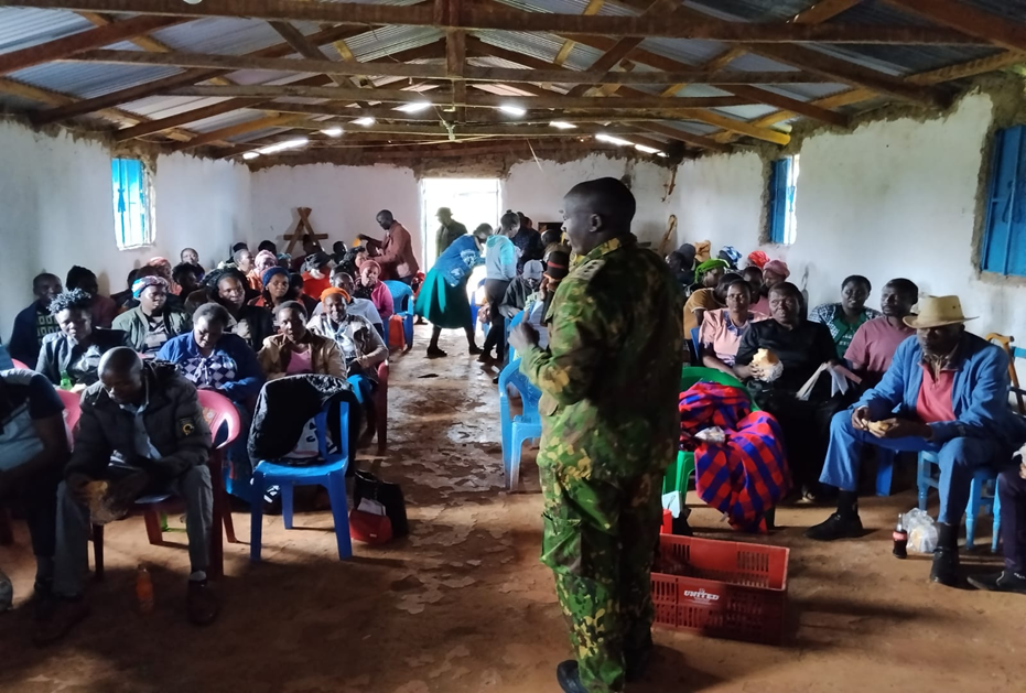 The GSU commander Western region, Mr. Thoma Kipkolei, addressed the community during the community Barasa on Women and Girls' rights protections on 9th March 2026 at Maranatha church, Chepyuk.